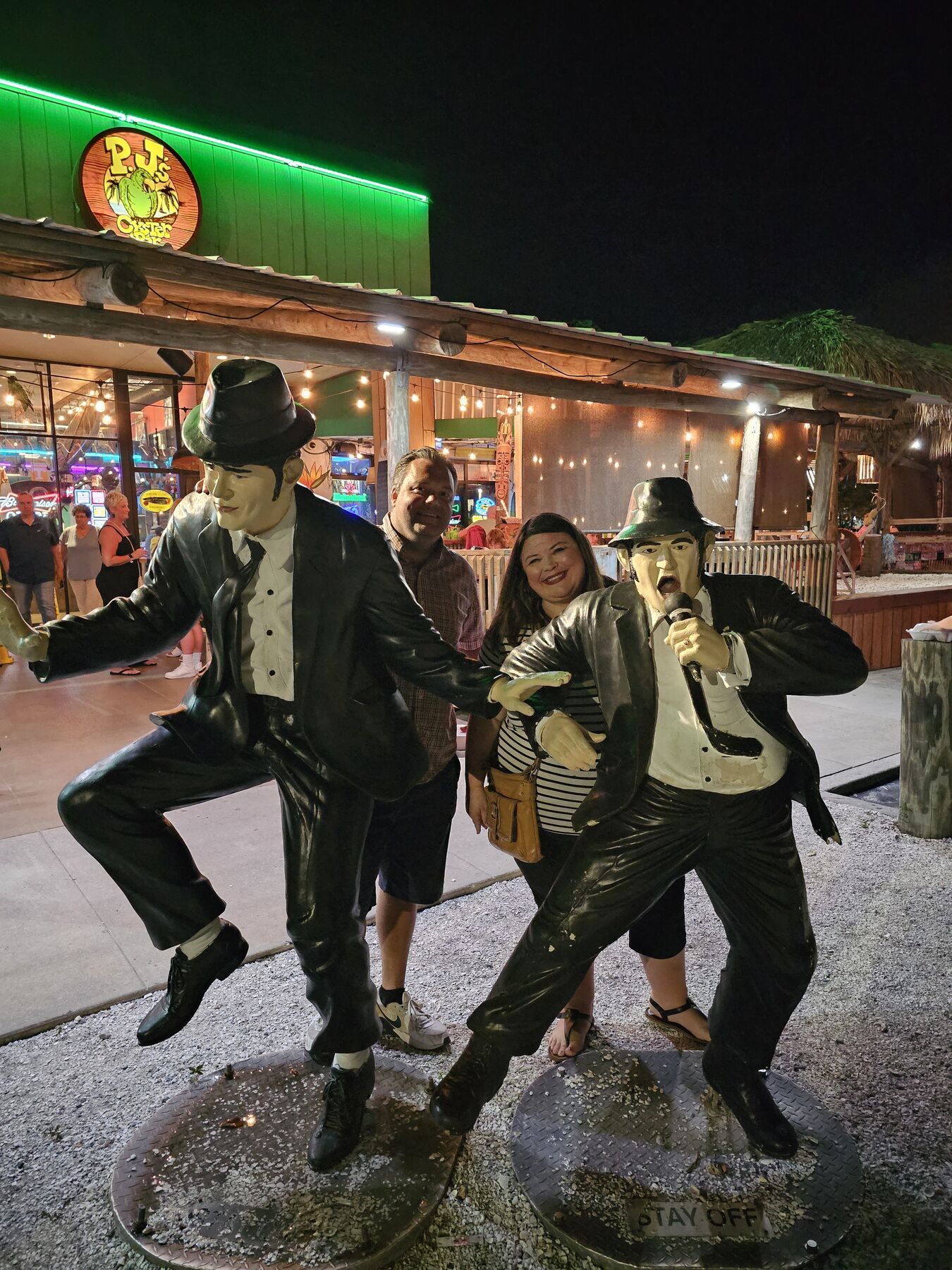 Two friends dancing as the Blues Brothers