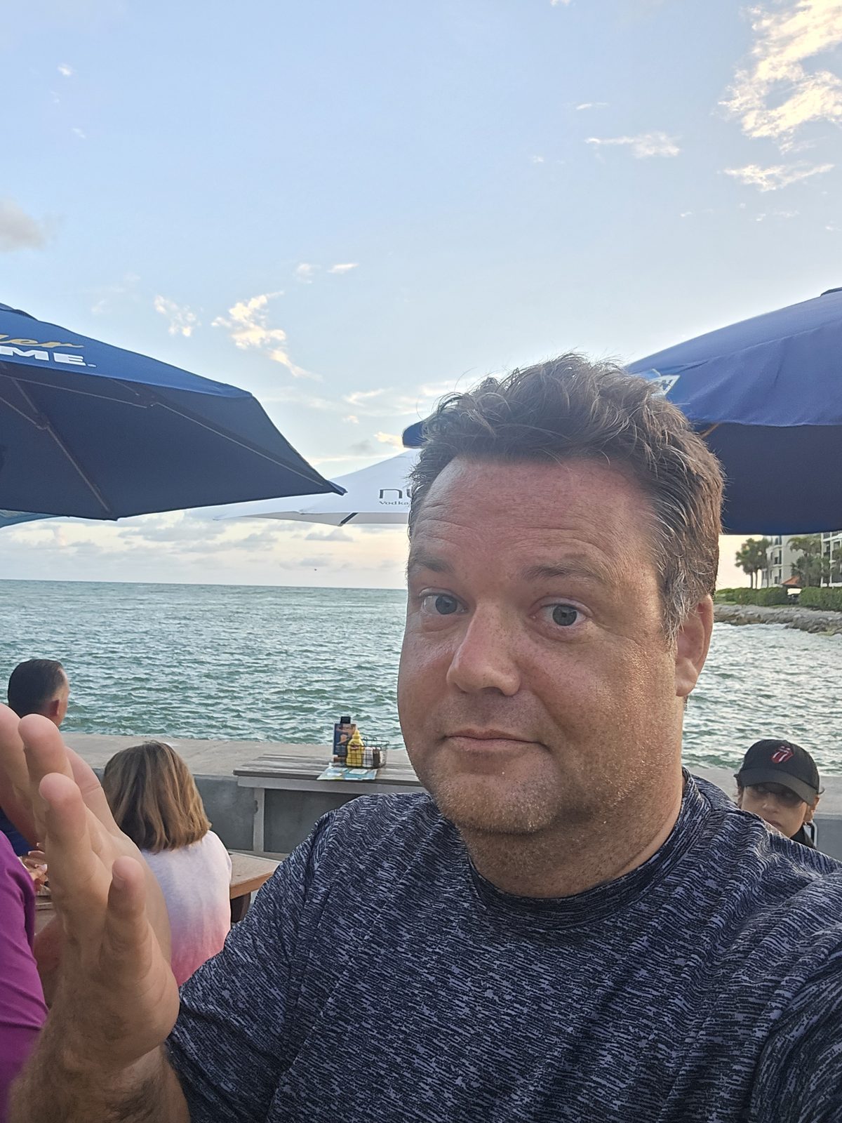 Justin at a beach bar