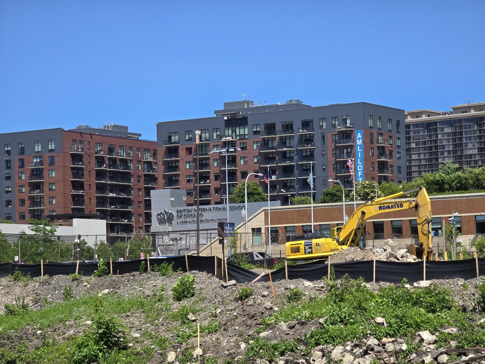 An excavator working a city build site