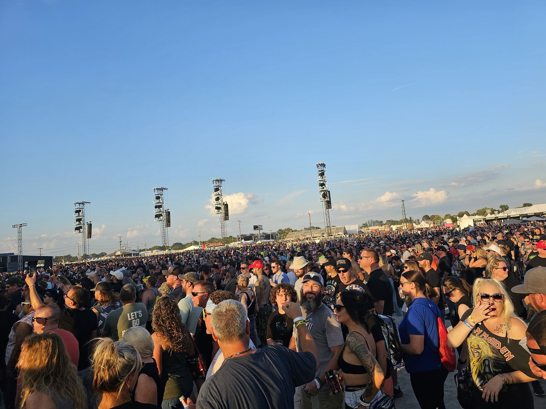A festival crowd in the sun