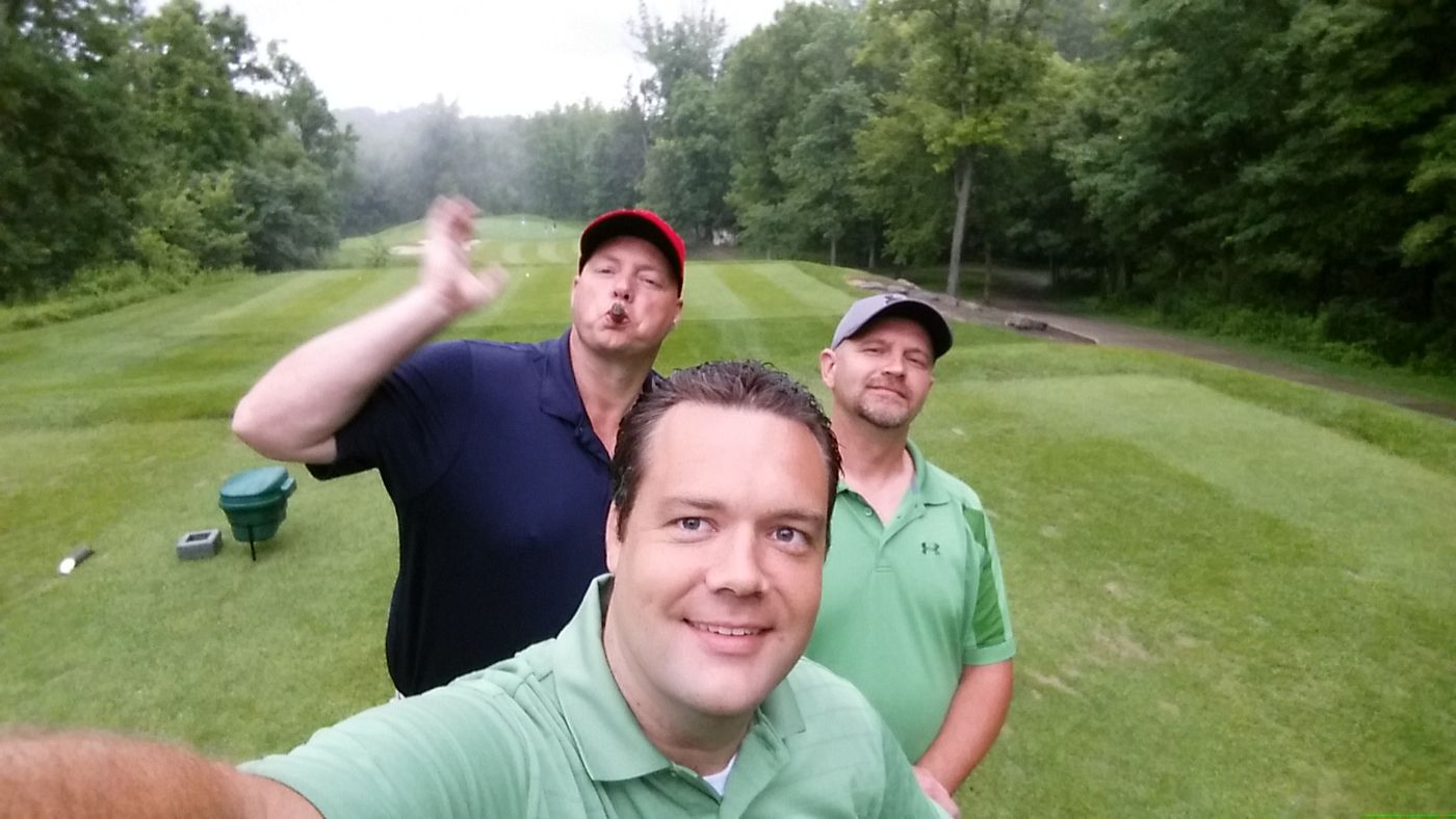 A selfie with friends on a golf course