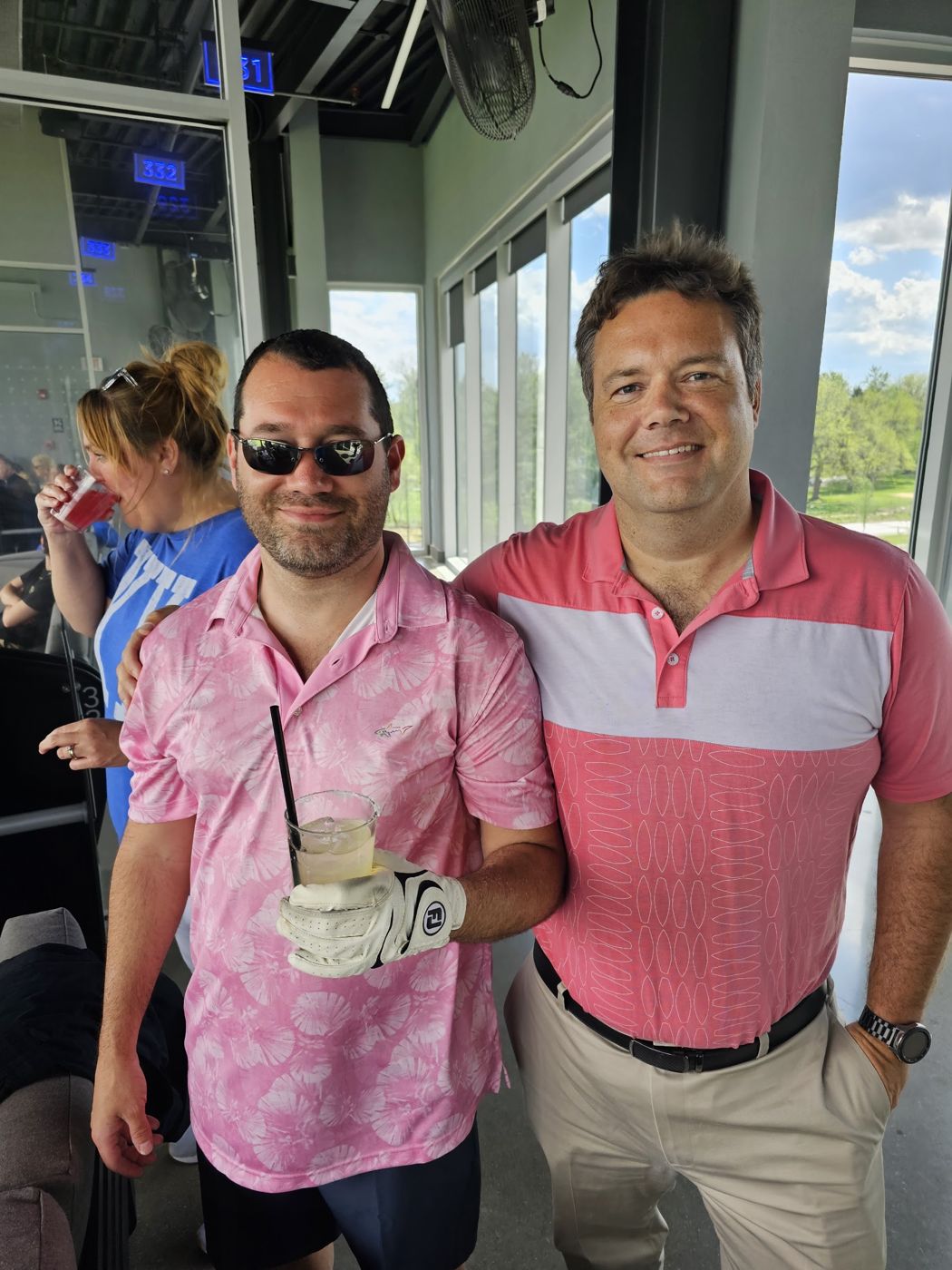 Justin and friends in pink at a golf outing