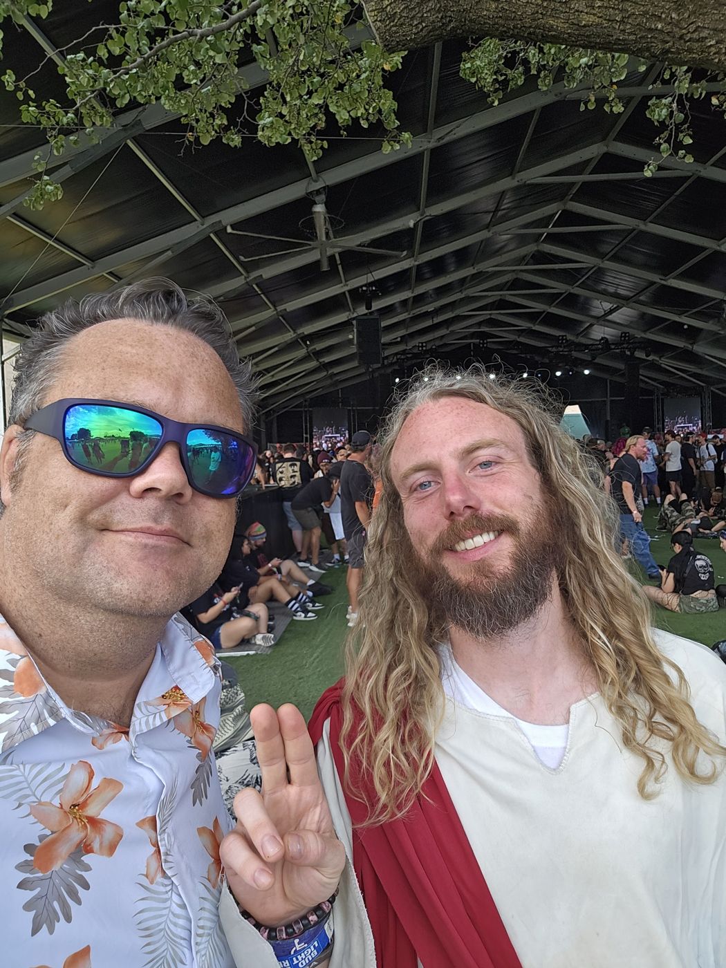 Justin and a friend in costume at a festival